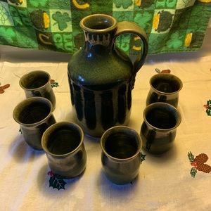 Decanter & 6 Pottery Drinking Vessels